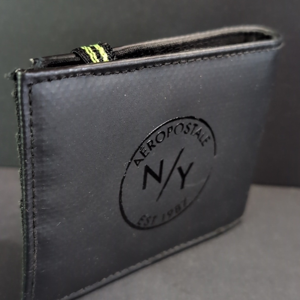 Aeropostale N/Y Black Bi-fold Wallet with Elastic Strap.